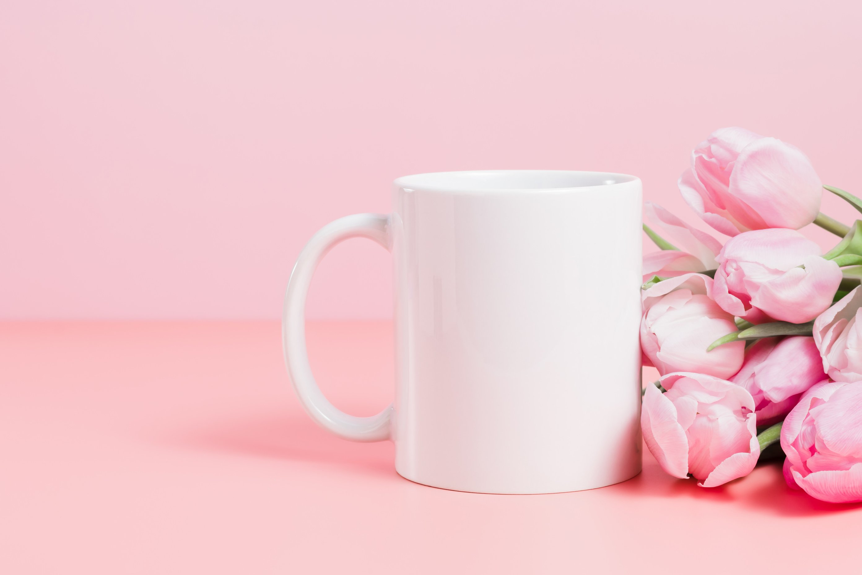 Mockup mug with pink tulips